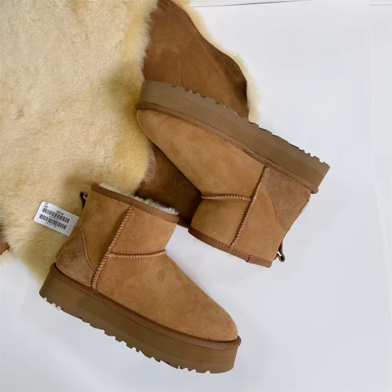 Nouvelle mode en cuir de mouton bottes de neige pour femmes laine naturelle fourrure doublé court Mini hiver chaud bottes décontractées bottines
